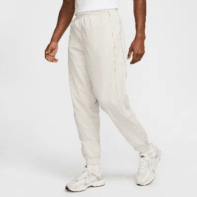 NIKE MEN'S SOLO SWOOSH TRACK PANTS
