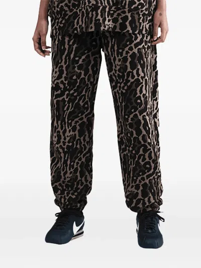 NIKE NSW PHOENIX PRINTED TRACK PANTS