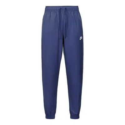 NIKE Nike Nsw Spe Wvn Athleisure Casual Sports Woven Bundle Feet Long Pants Navy Blue