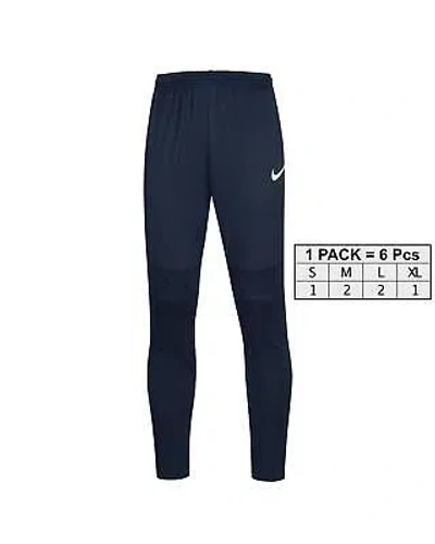 NIKE NIKE PRINTED BLUE TROUSERS WITH LACES AND FRONT POCKETS - PANTS