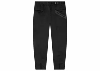 NIKE SPORTSWEAR WOMEN'S TECH PACK WOVEN PANTS IN BLACK