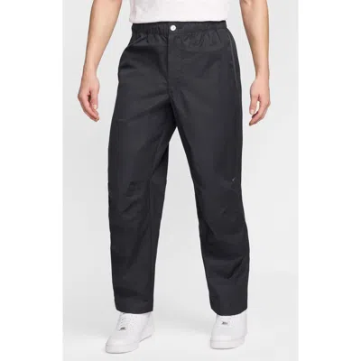 NIKE NIKE TECH WOVEN FLAT FRONT PANTS