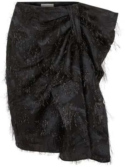 NINA RICCI ASYMMETRIC BOW SKIRT