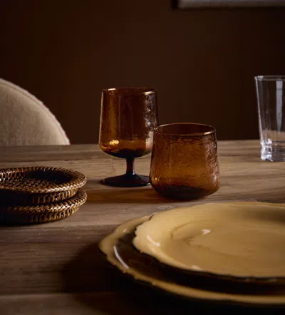 OKA RATTAN COASTERS - SET OF FOUR - ANTIQUE BROWN