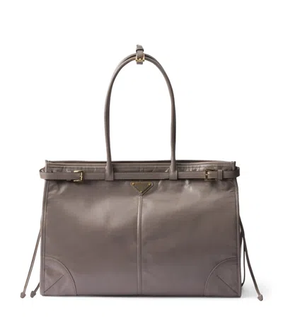 PRADA LARGE LEATHER BELTED TOTE BAG
