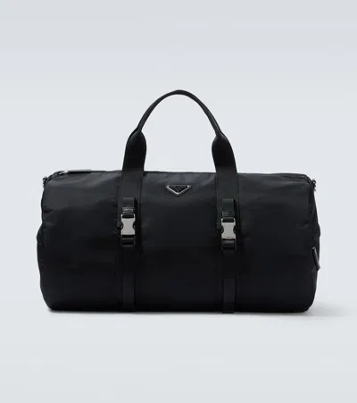 PRADA RE-NYLON LEATHER-TRIMMED DUFFEL BAG