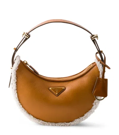 PRADA SMALL SHEARLING ARQUÉ SHOULDER BAG