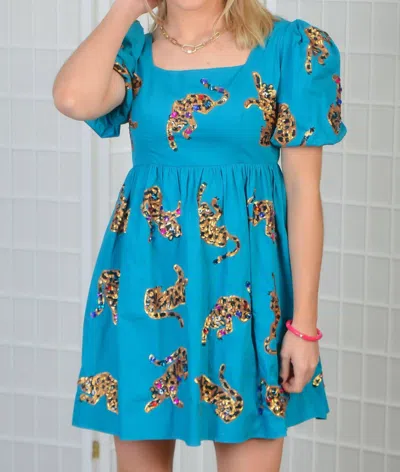 QUEEN OF SPARKLES QUEEN OF SPARKLES LEAPIN' LEOPARDS BABYDOLL DRESS IN TEAL