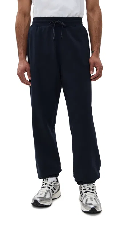 REIGNING CHAMP MIDWEIGHT TERRY CUFFED RELAXED SWEATPANTS NAVY