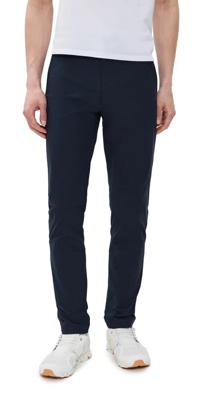REIGNING CHAMP STRETCH WARP KNIT COACH'S SLIM PANTS NAVY