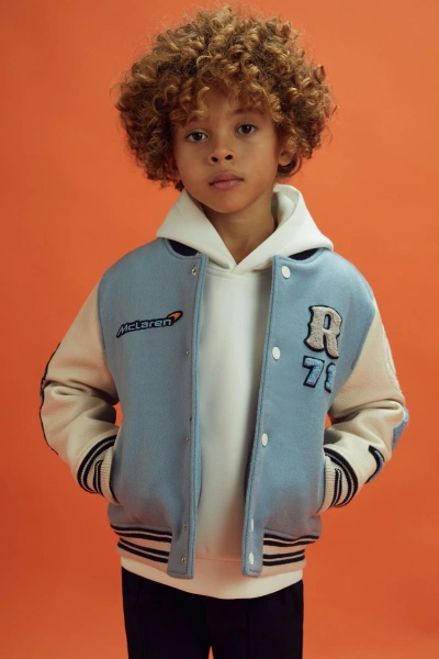 REISS MCLAREN X MCLAREN F1 TEAM AIRFORCE BLUE/ECRU 3-9 YRS MCLAREN F1 LEATHER VARSITY JACKET
