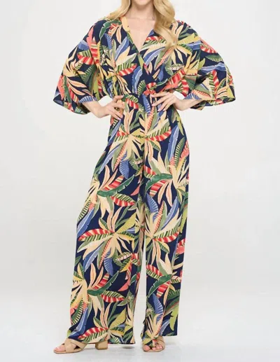 RENEEC. TROPICAL PRINT V NECK WIDE LEG JUMPSUIT IN NAVY