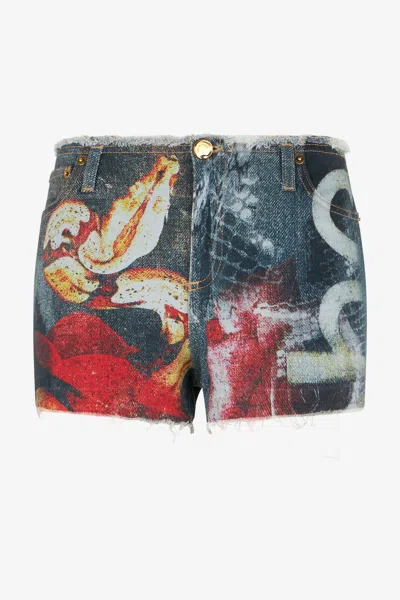 ROBERTO CAVALLI SHORTS AUS DENIM MIT ROSEN UND SCHLANGEN