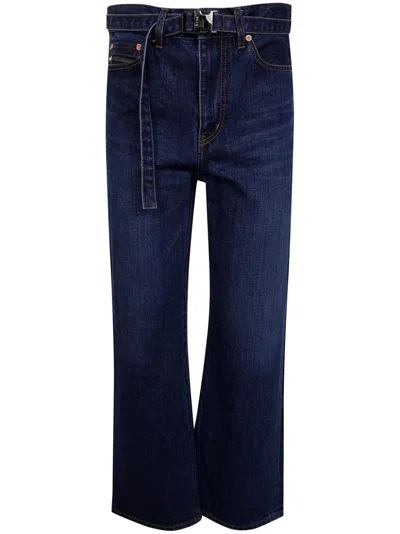 SACAI BELTED JEANS