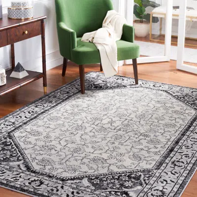 SAFAVIEH BRENTWOOD MACHINE MADE AREA RUG, BLACK / IVORY TRADITIONAL STYLE EASY CARE