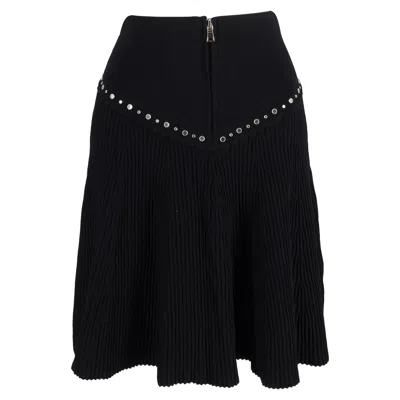 SANDRO ORIA RIBBED MINI EMBELLISHED FLARED SKIRT IN BLACK VISCOSE