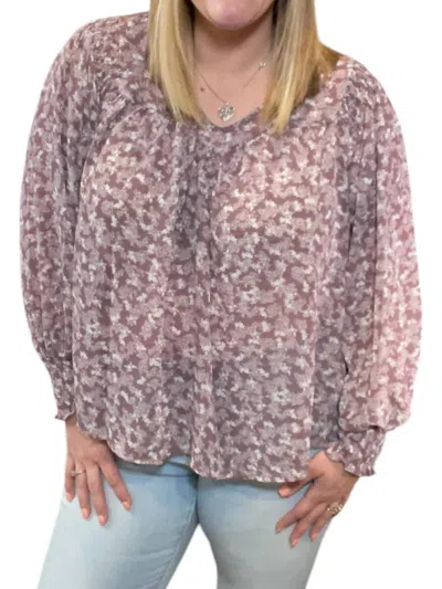 SHE + SKY FLORAL SMOCKED LONG SLEEVE TOP IN PURPLE