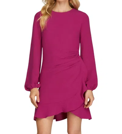 SHE + SKY LONG SLEEVE ASYMMETRICAL RUFFLED HEM DRESS IN PINK
