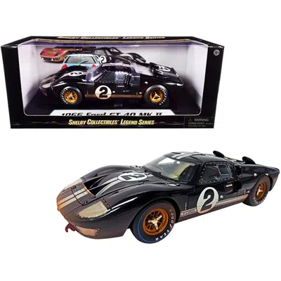 SHELBY COLLECTIBLES 1966 FORD GT-40 MK II NO.2 BLACK WITH SILVER STRIPES AFTER RACE DIRTY VERSION 1 BY 18 SCALE DIECAST 