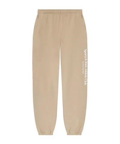 SPORTY AND RICH SPORTY  RICH ATHLETIC CLUB TAPERED LEG PANTS