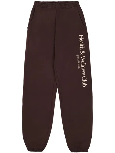 SPORTY AND RICH H&W CREST TRACK PANTS