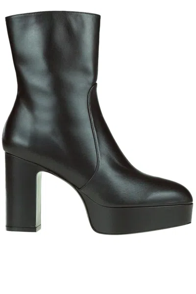 STUART WEITZMAN LALA PLATFORM BOOTS
