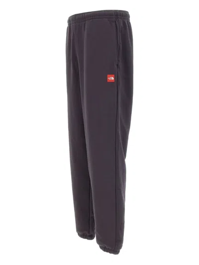 THE NORTH FACE LOGO-PATCH ELASTICATED-CUFF TRACK PANTS