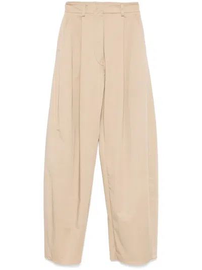 THE LATEST PLEATED TROUSERS