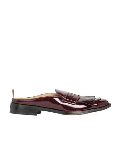 THOM BROWNE FRINGED PENNY LOAFERS