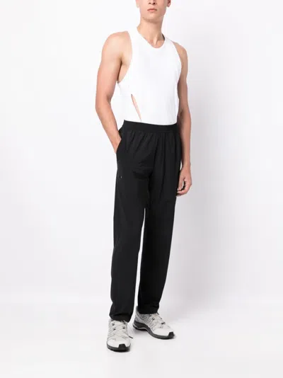 TRUE TRIBE LOGO-PATCH ELASTICATED-WAIST TROUSERS