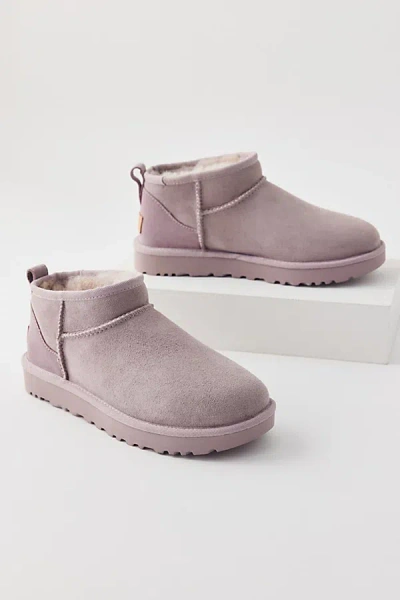 UGG CLASSIC ULTRA MINI ANKLE BOOT IN DUSTY ORCHID, WOMEN'S AT URBAN OUTFITTERS