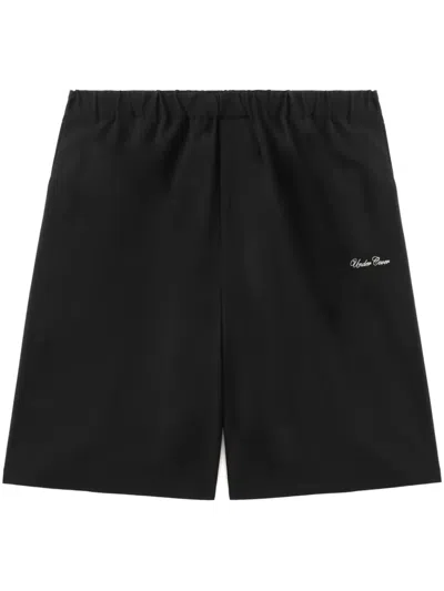 UNDERCOVER TEXT-PRINT SHORTS