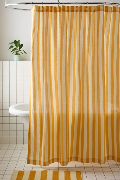 URBAN OUTFITTERS AWNING STRIPE PATTERNED SHOWER CURTAIN IN BUTTER AT URBAN OUTFITTERS