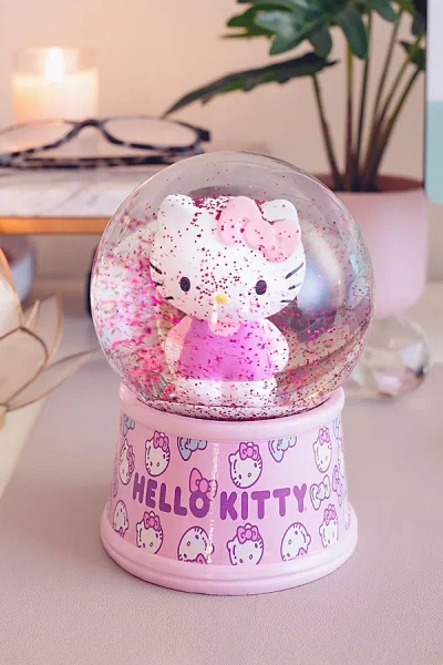 URBAN OUTFITTERS SANRIO HELLO KITTY LIGHT-UP 6" SNOW GLOBE IN PINK AT URBAN OUTFITTERS