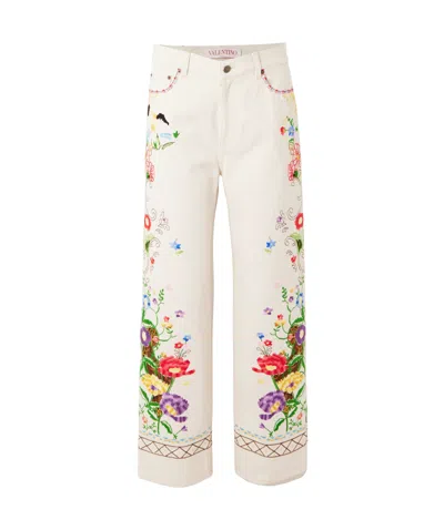 VALENTINO VALENTINO LOGO PATCH FLORAL PATTERNED JEANS