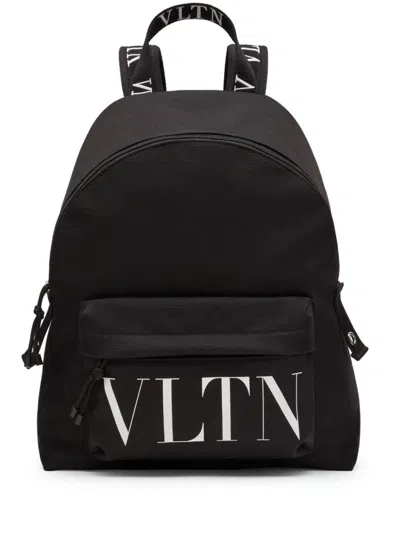 VALENTINO GARAVANI VALENTINO BUCKET BAG & BACKPACK WITH ICONIC BRANDING AND VERSATILE DESIGN