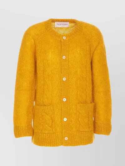 VALENTINO CABLE KNIT WOOL CARDIGAN WITH FRONT POCKETS