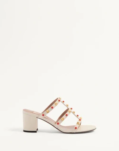 VALENTINO GARAVANI VALENTINO GARAVANI ROCKSTUD SLIDE SANDAL IN CALFSKIN WITH CABOCHON STONES 60MM WOMAN IVORY/CORAL 42