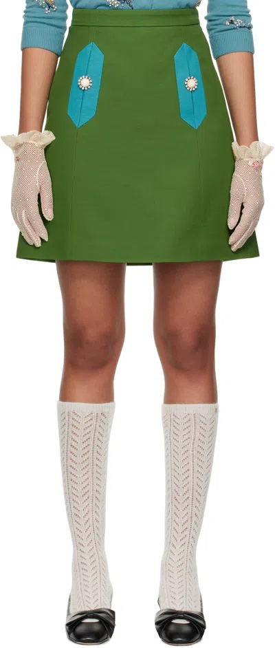 VALENTINO GREEN SOLID CREPE COUTURE MINISKIRT