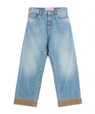 VALENTINO VALENTINO LOGO PATCH WIDE LEG JEANS