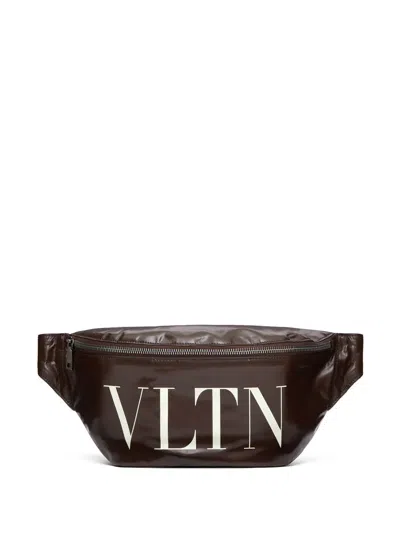 VALENTINO GARAVANI LOGO-PRINT LEATHER BELT BAG