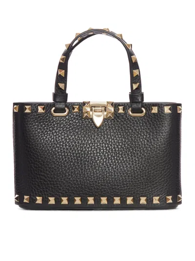 VALENTINO GARAVANI MINI ROCKSTUD SHOPPING BAG IN GRANATE CALFSKIN