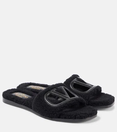 VALENTINO GARAVANI VLOGO CUTOUT FAUX SHEARLING SLIDES