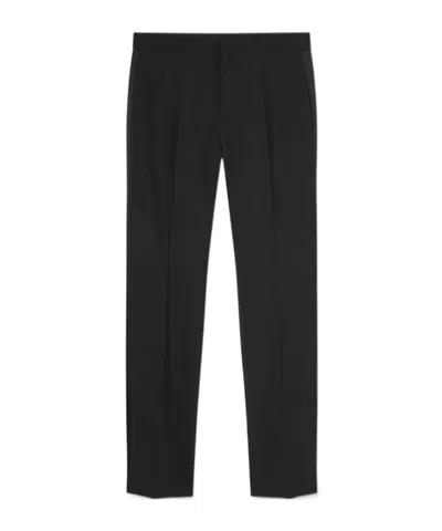 VERSACE VERSACE LOGO-APPLIQUÉ TAPERED-LEG CHINO TROUSERS