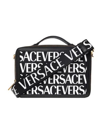 VERSACE LOGO-PRINT LEATHER MESSENGER BAG