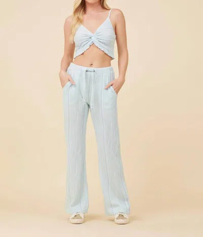 VINTAGE HAVANA STRIPED TEXTURED FLARE PANTS IN BLUE MULTI