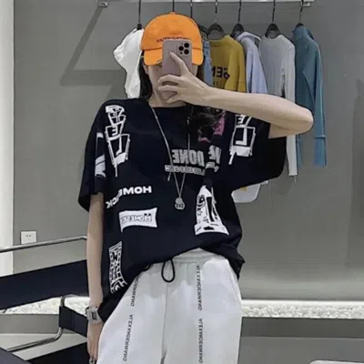 WE11 DONE PATTERN PRINTED T-SHIRT